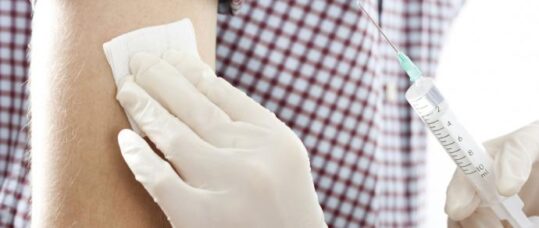 Frontline workers urged to get flu vaccine