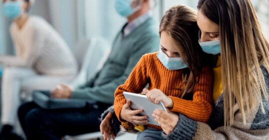 Face masks should still be worn in GP practices, says NHS England