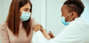 Long Covid risk halved by vaccination, research shows
