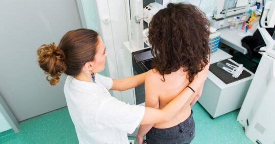 NHS apologises to high-risk patients not told about annual breast screening checks