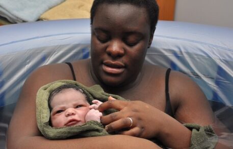 Birthing pool delivery as safe as outside of water, study finds